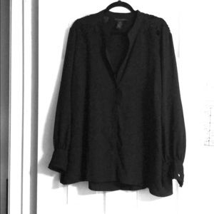 Blouse with cut out designs